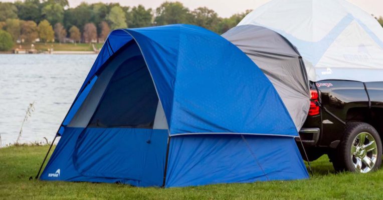 blue ground tent with 4x4 car