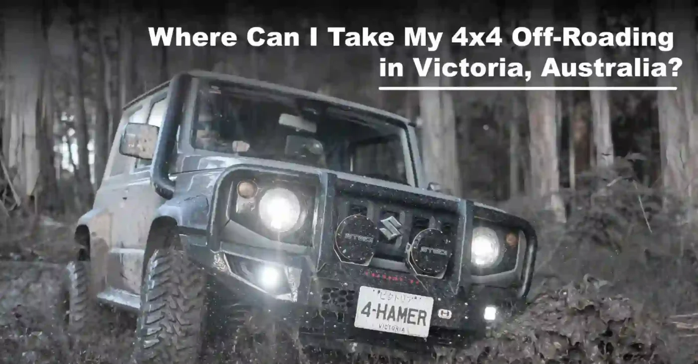 4x4 black Suzuki Hamer with front round big lights in a mud1